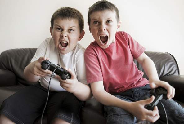 Kids playing videogames